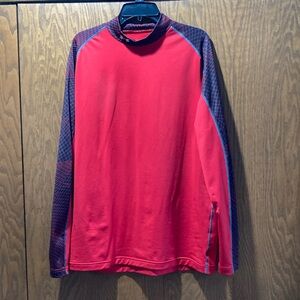 Under Armour red and black fitted cold gear long sleeved shirt. Size 2XL
